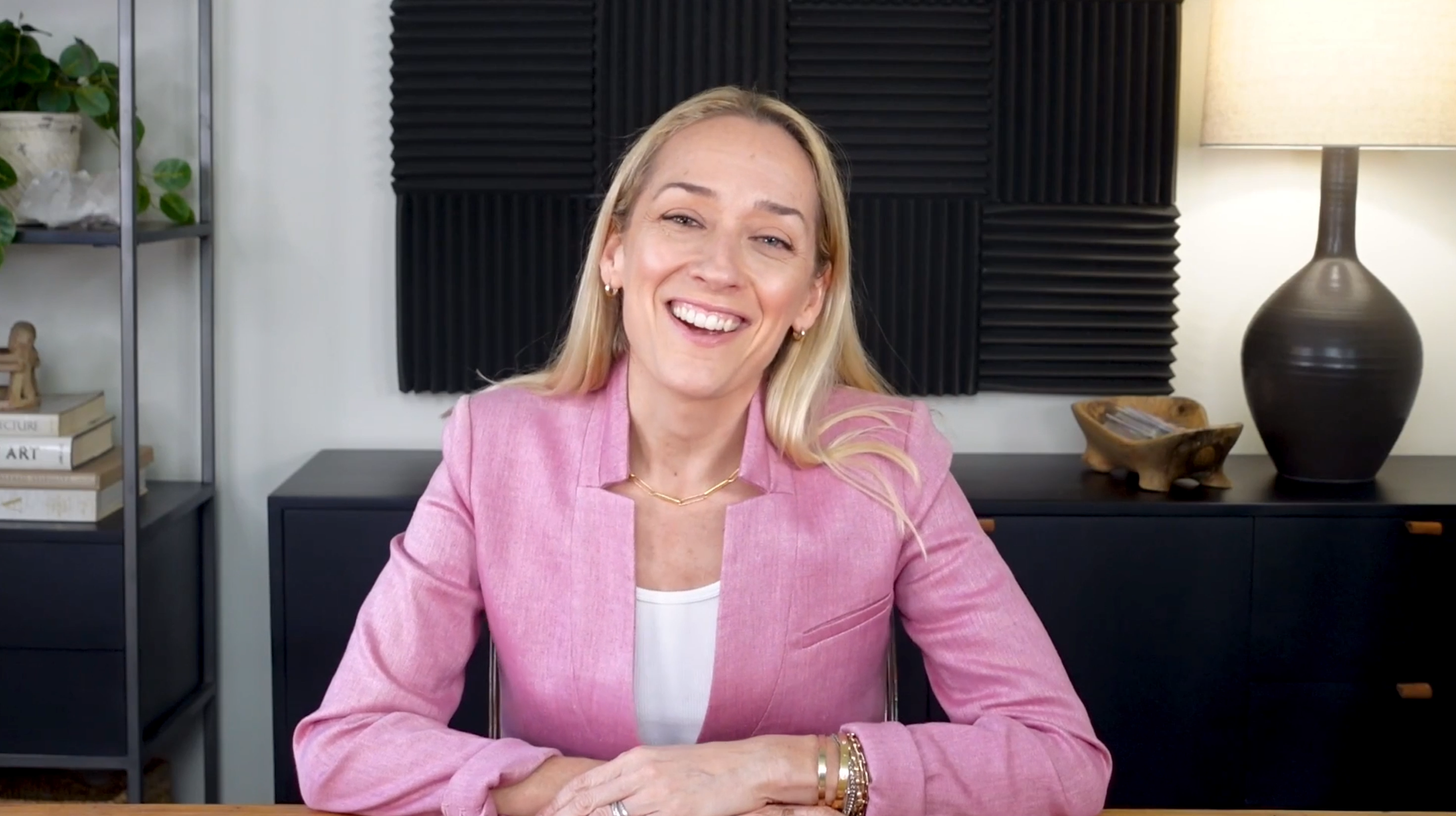 Kris Carr smiling in her studio