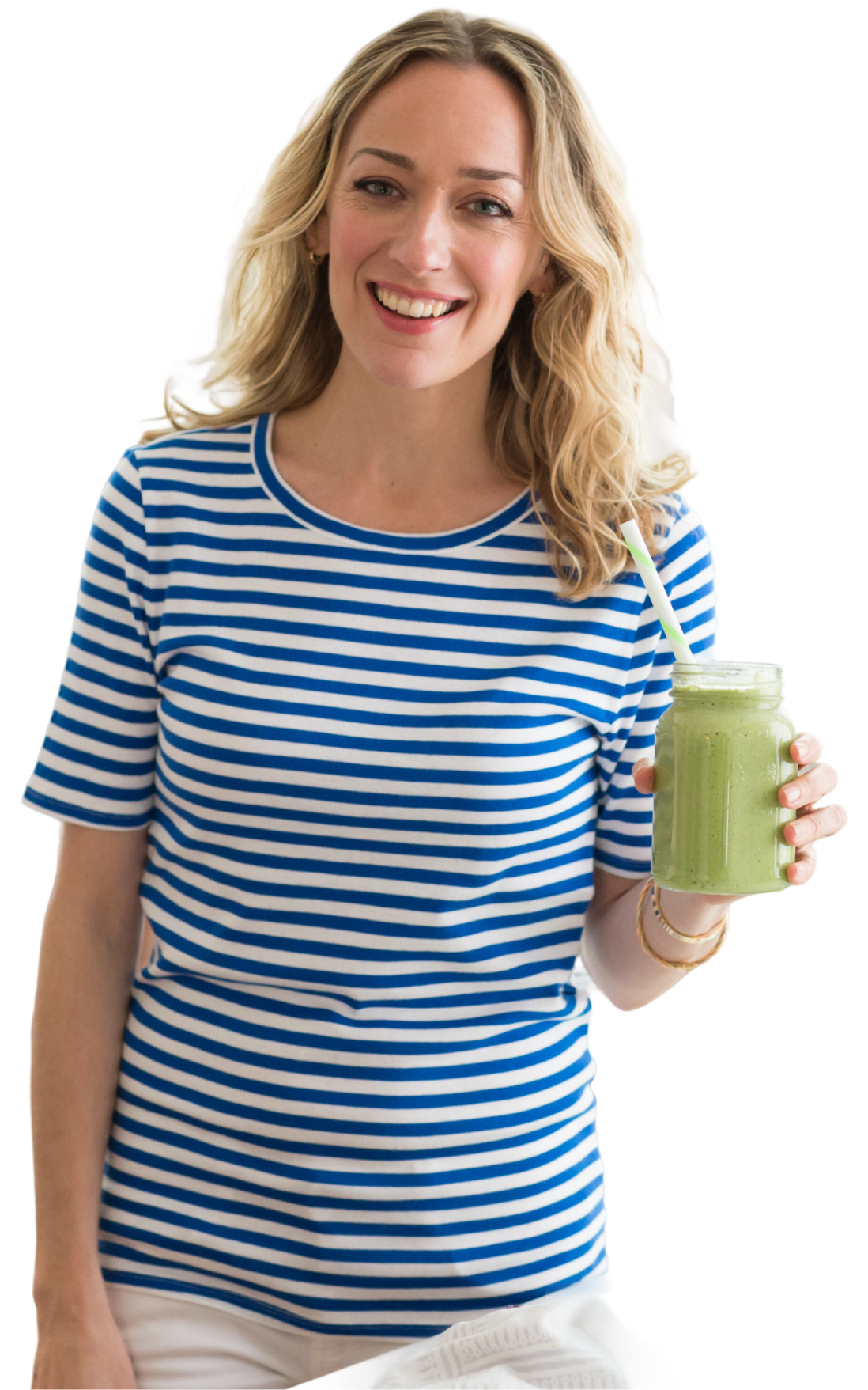 Kris Carr holding a green smoothie